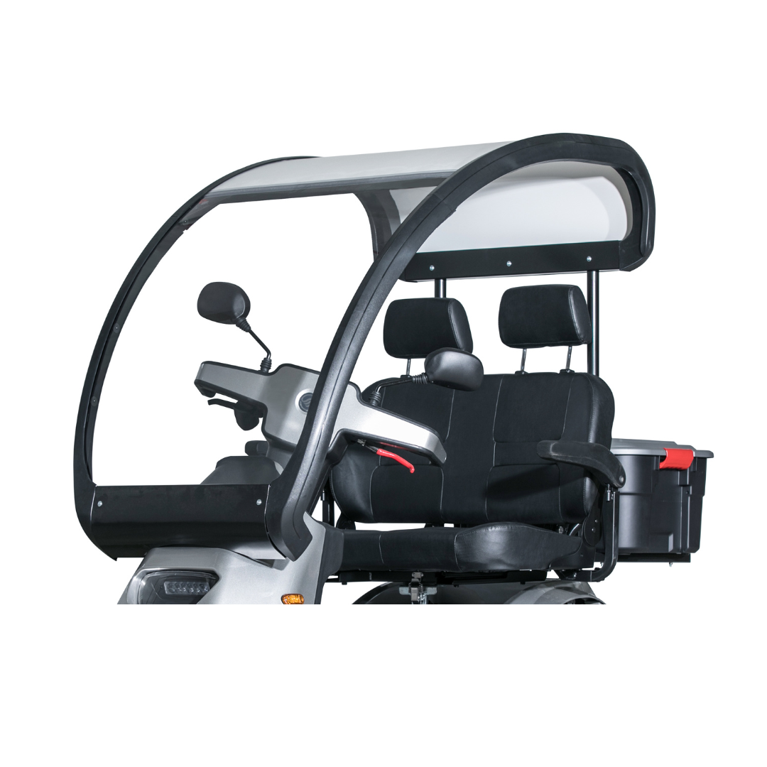 The Afikim Electric Vehicle Accessories features a three-wheeled mobility scooter with two seats and a canopy. Its black and silver design includes a rear storage box, side mirrors, and a front transparent cover on a crisp white background for optimal mobility options.